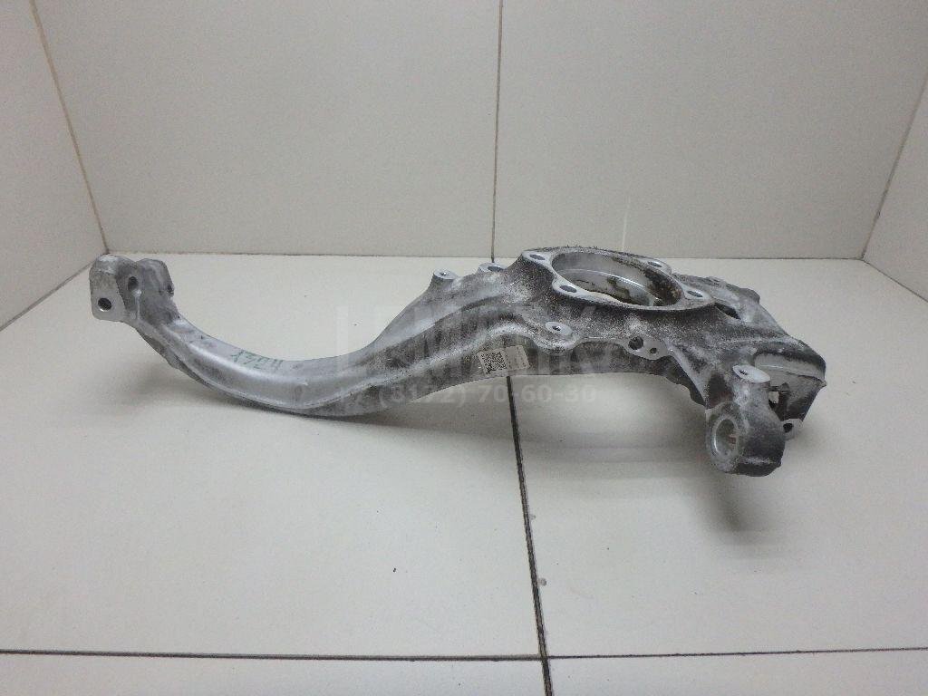 Кулак поворотный передний левый