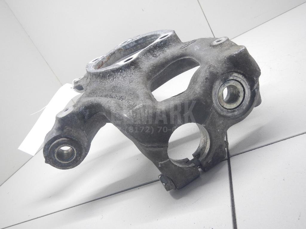 Кулак поворотный передний левый