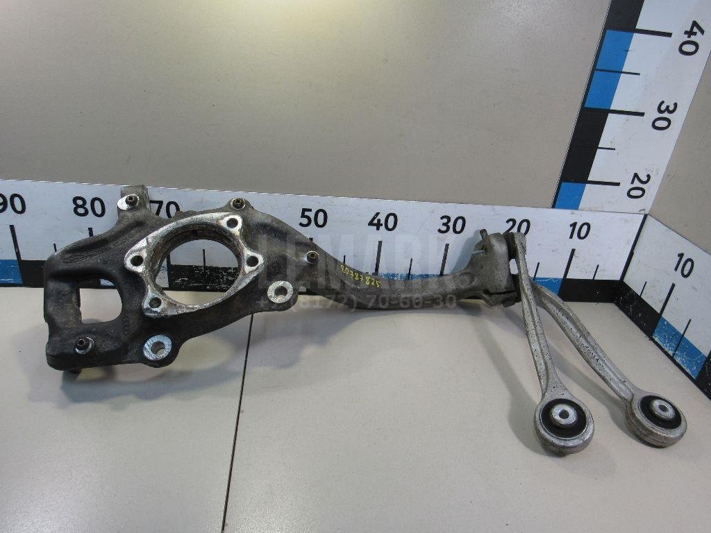 Кулак поворотный передний левый