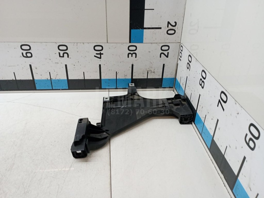 Кронштейн фар левый