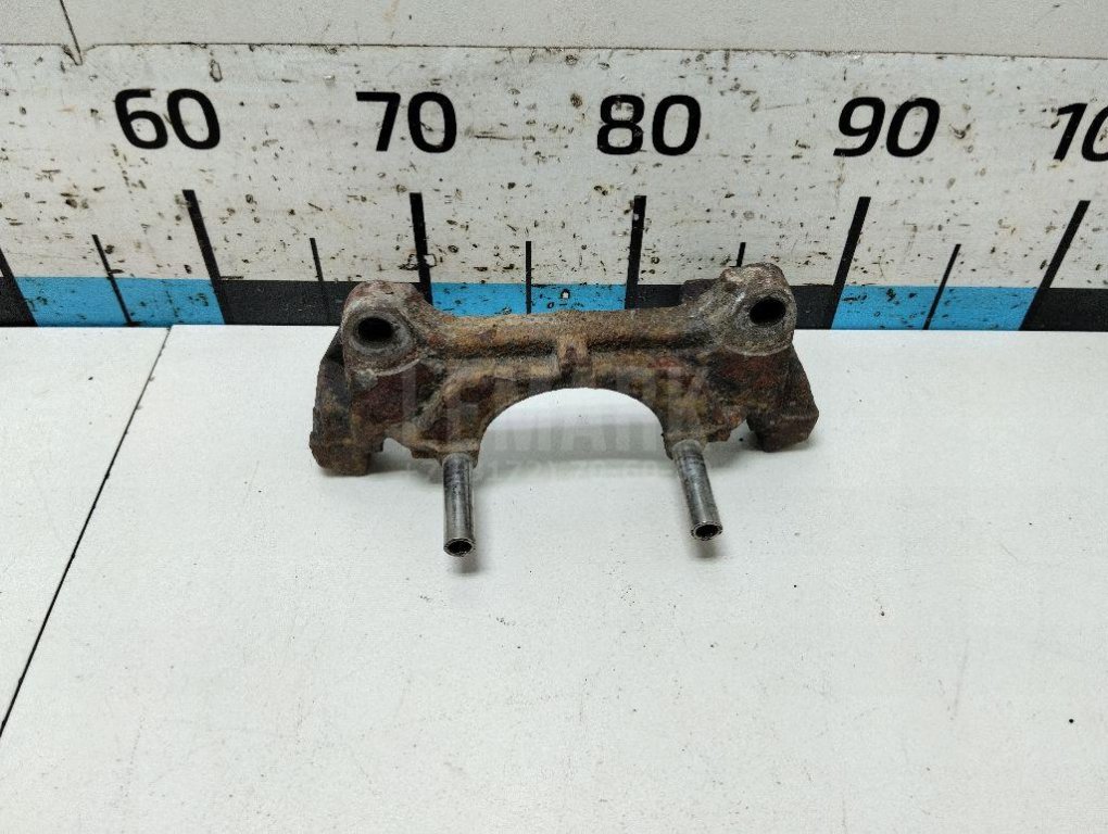 Скоба суппорта переднего