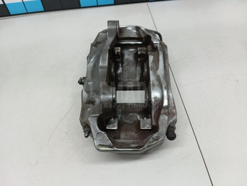 Суппорт тормозной передний правый