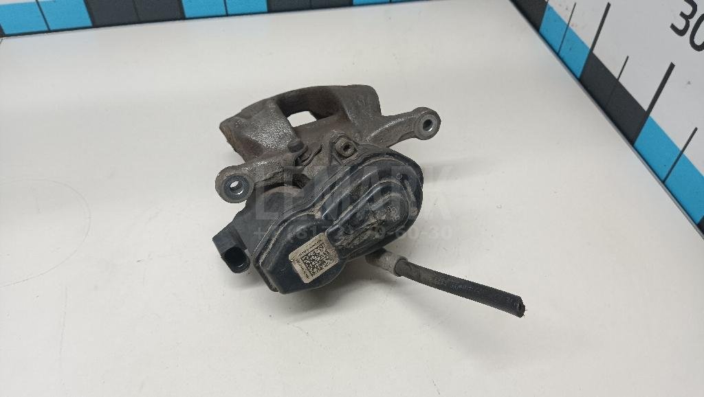 Суппорт тормозной задний левый