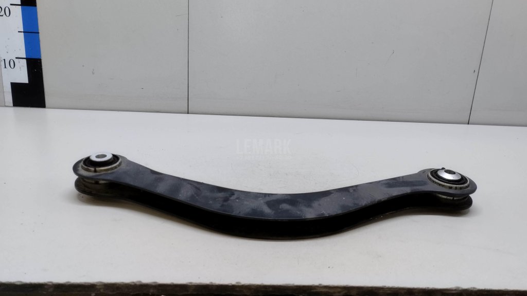 Рычаг задний верхний левый