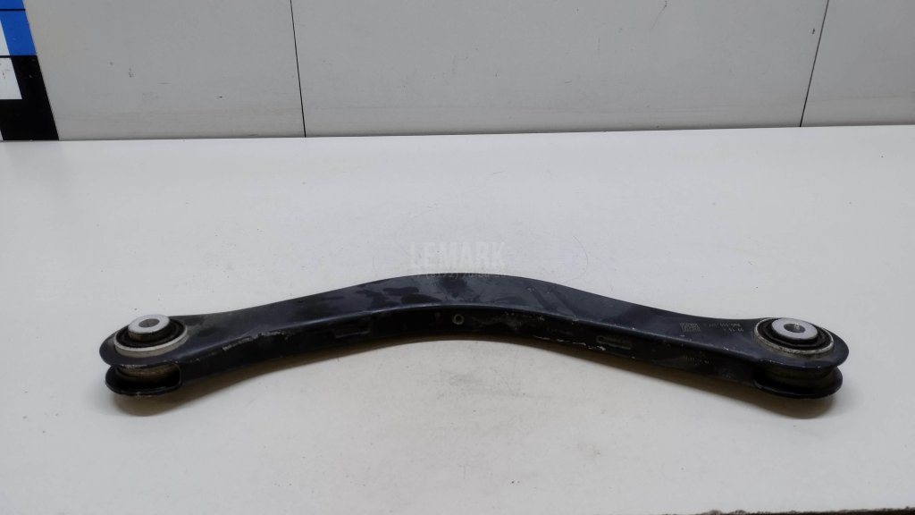 Рычаг задний верхний левый
