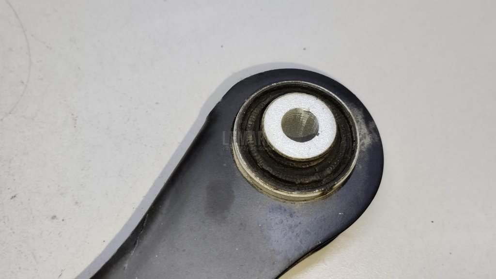 Рычаг задний верхний левый