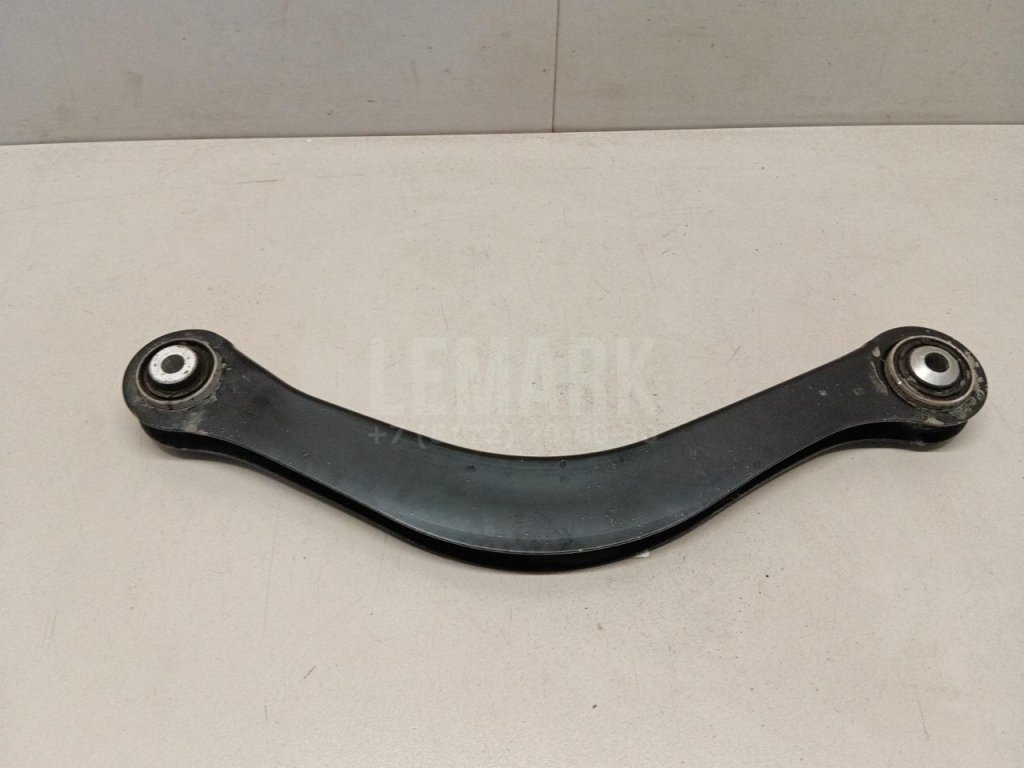 Рычаг задний верхний левый