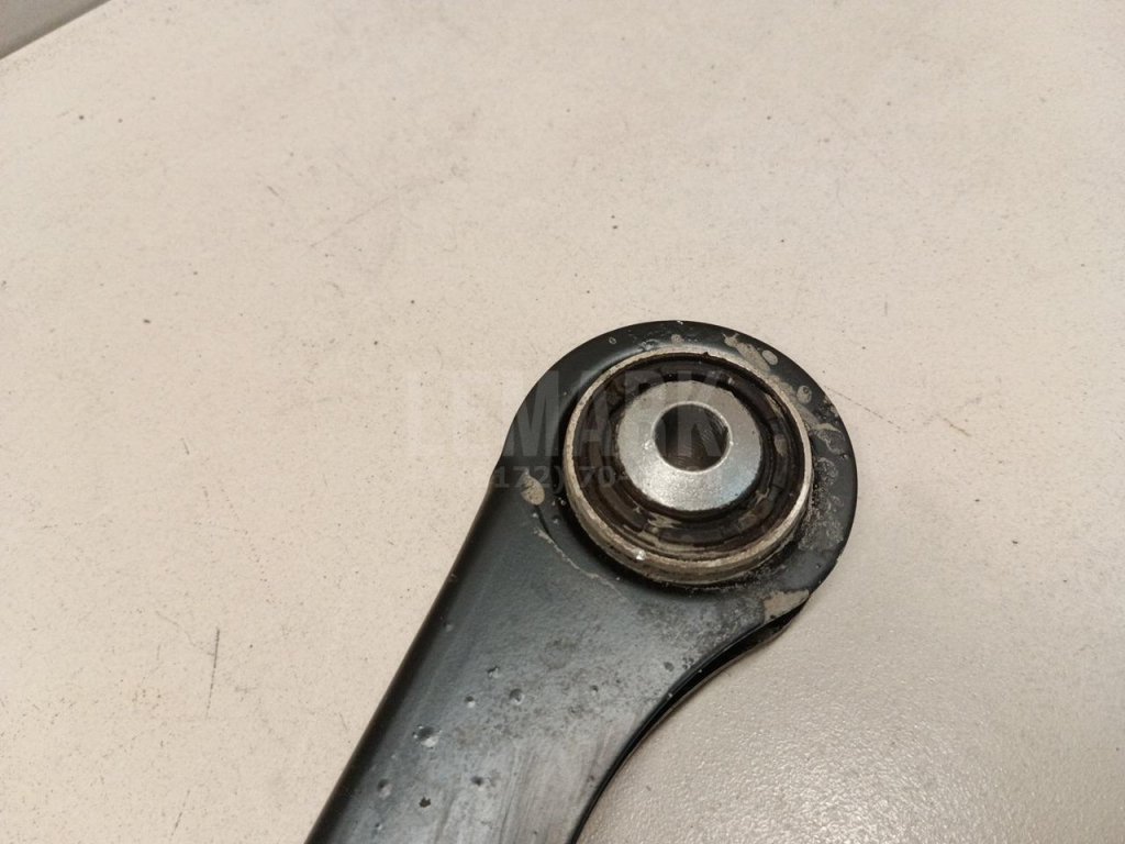 Рычаг задний верхний левый