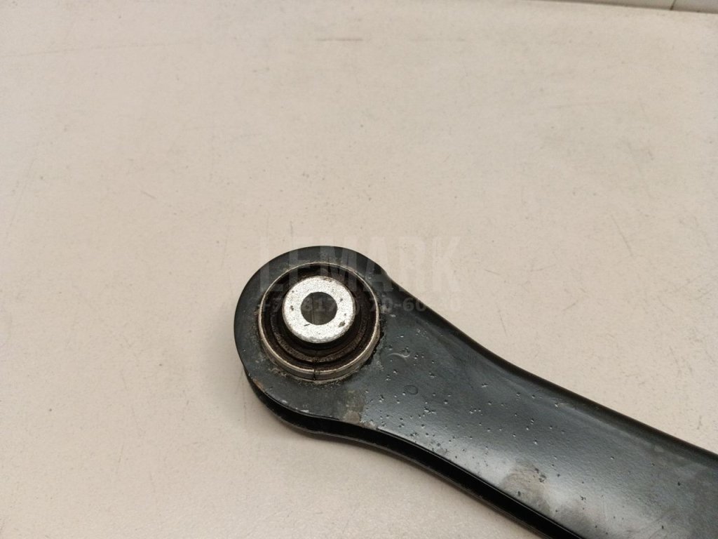 Рычаг задний верхний левый