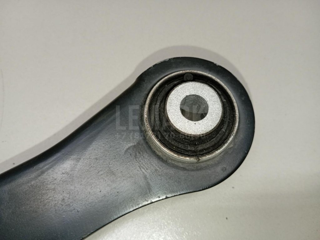 Рычаг задний верхний левый