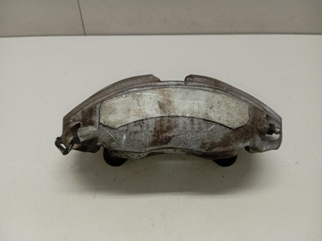 Суппорт тормозной передний правый