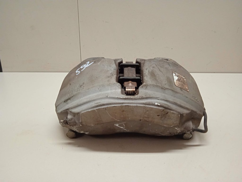 Суппорт тормозной передний левый