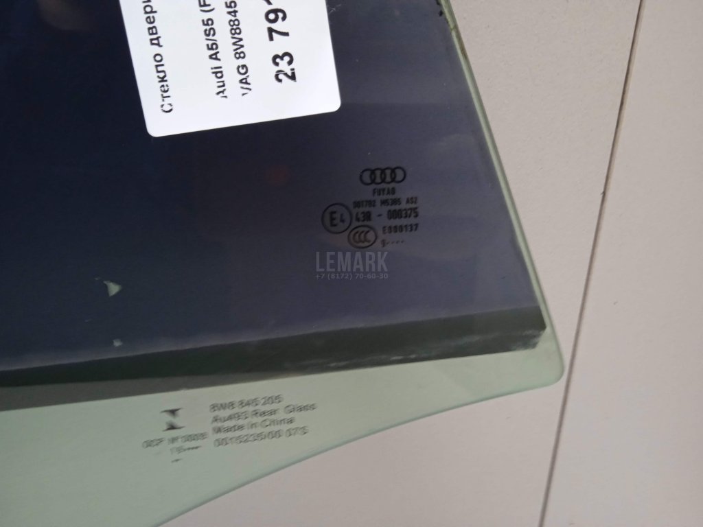 Стекло двери задней левой