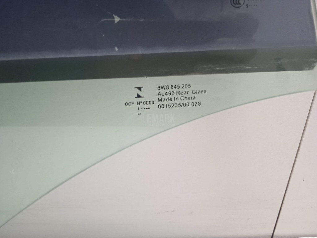 Стекло двери задней левой