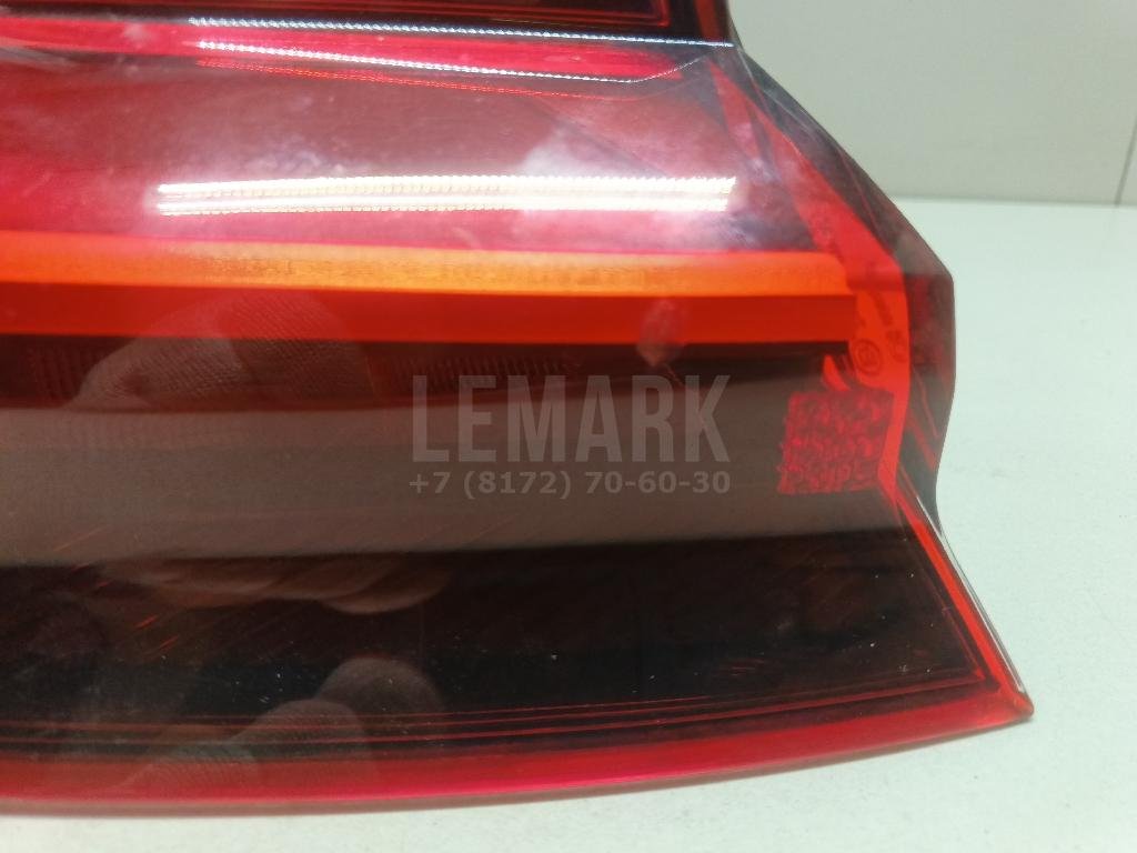 Фонарь задний наружный левый