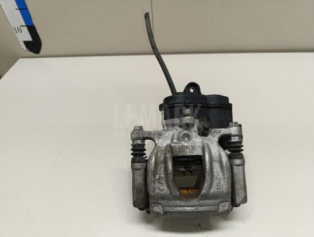 Суппорт тормозной задний левый