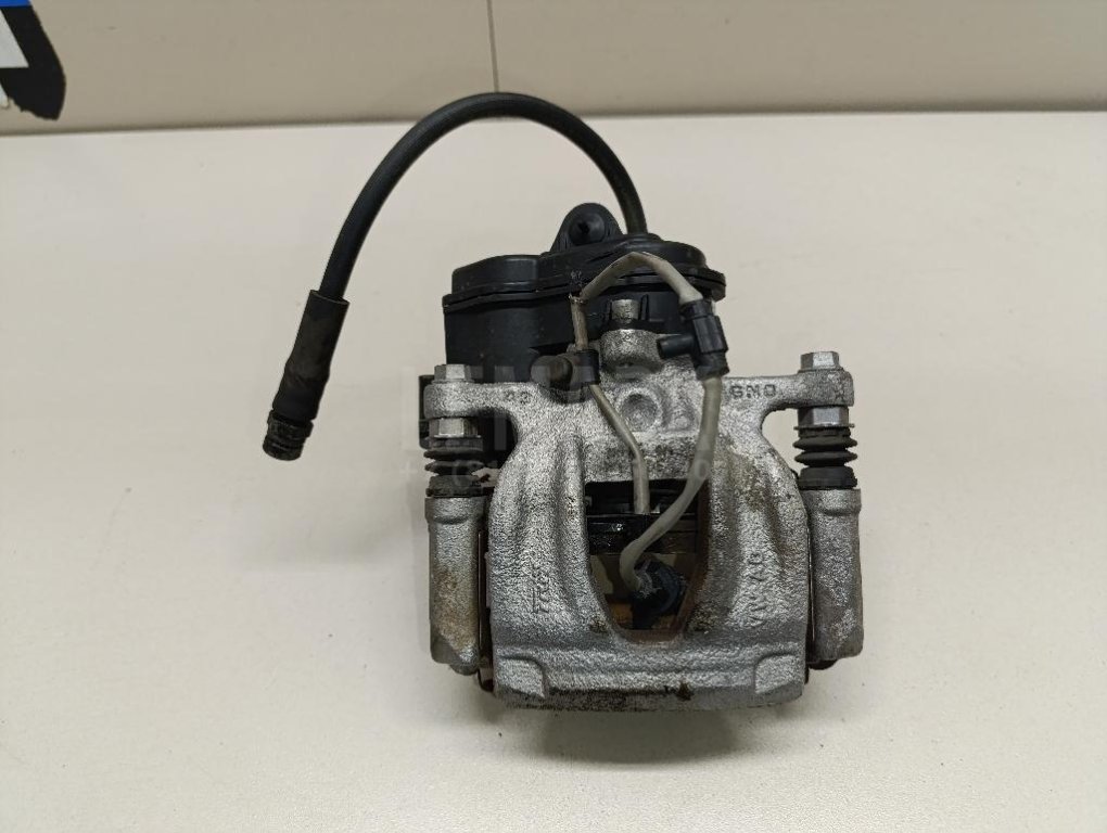 Суппорт тормозной задний правый