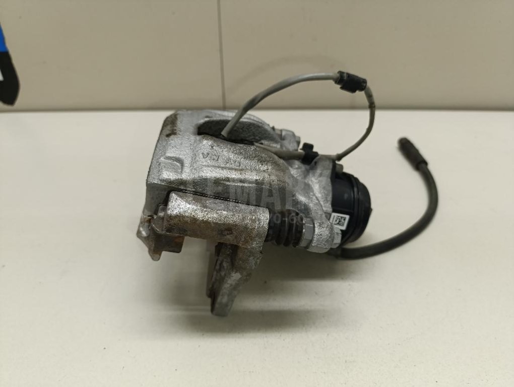 Суппорт тормозной задний правый