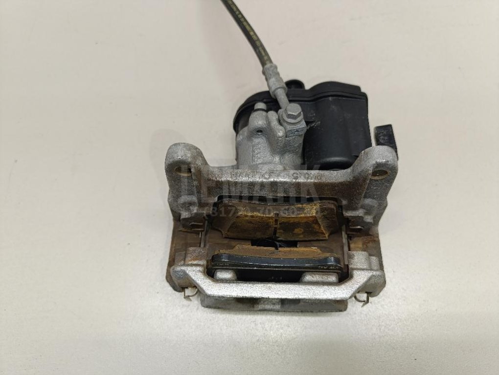 Суппорт тормозной задний правый