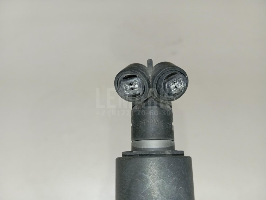 Форсунка омывателя фары