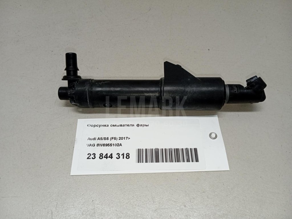 Форсунка омывателя фары