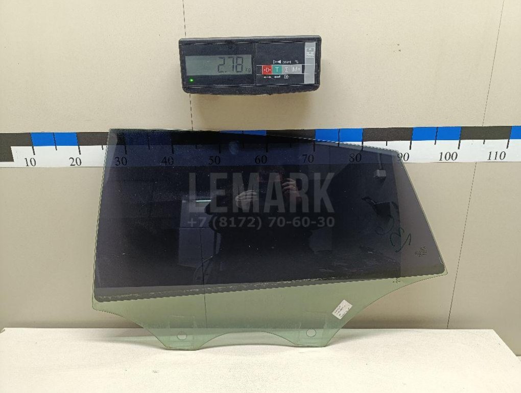 Стекло двери задней левой