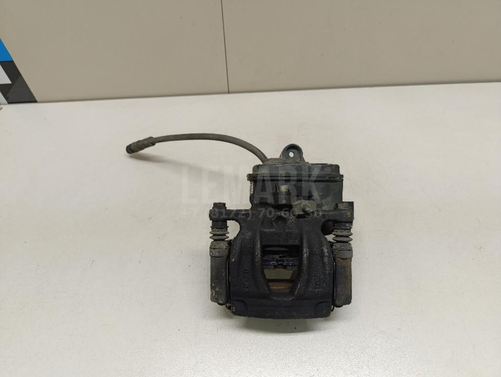 Суппорт тормозной задний левый