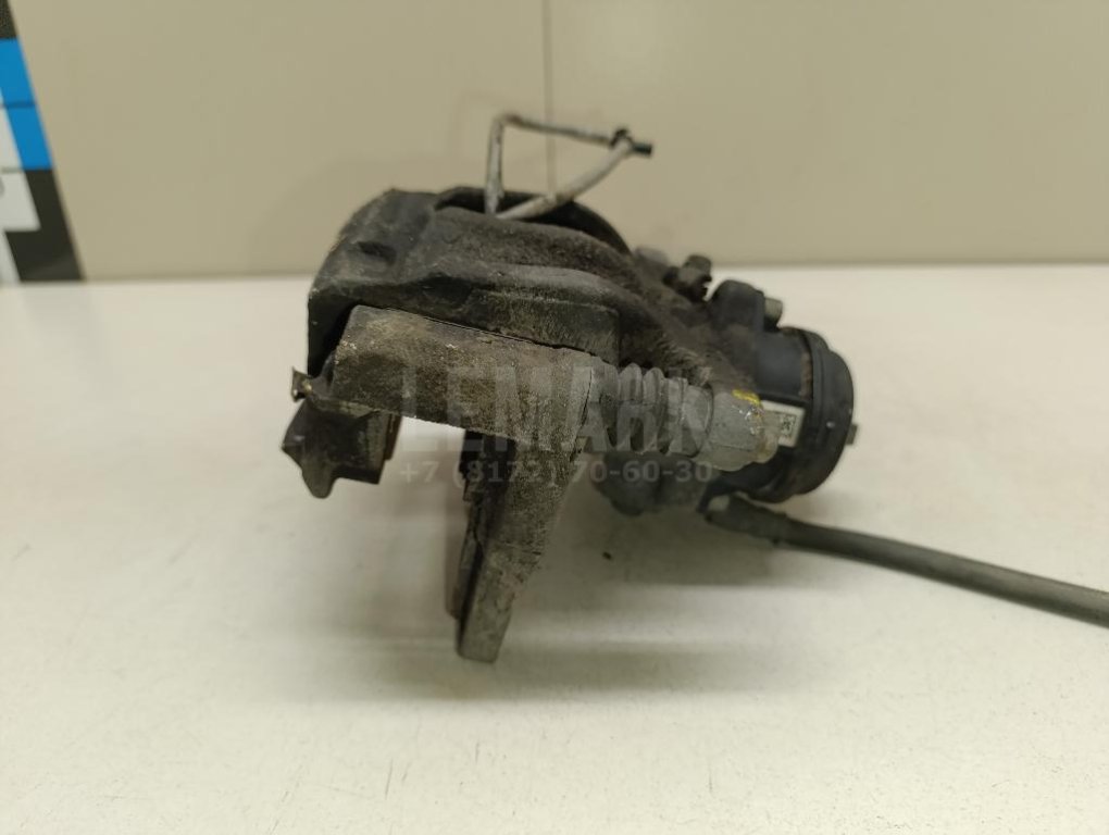 Суппорт тормозной задний правый