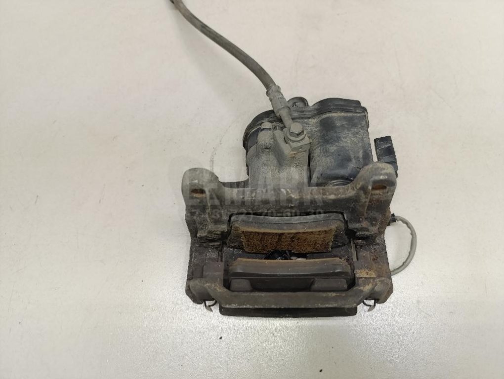 Суппорт тормозной задний правый