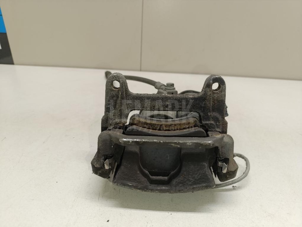 Суппорт тормозной задний правый