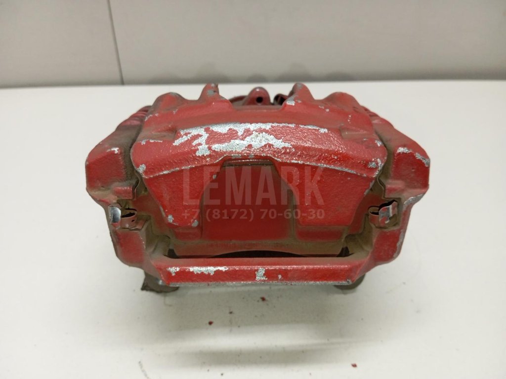 Суппорт тормозной задний левый