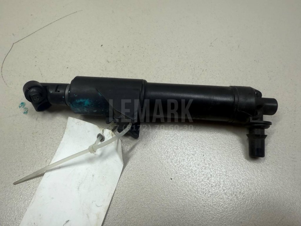 Форсунка омывателя фары