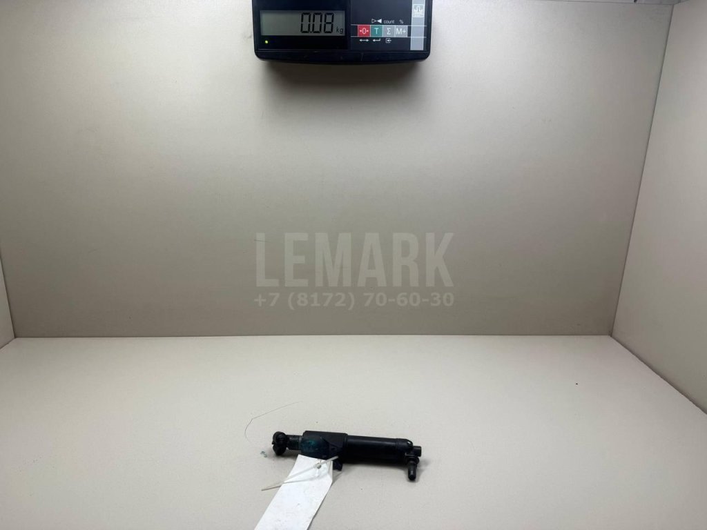 Форсунка омывателя фары