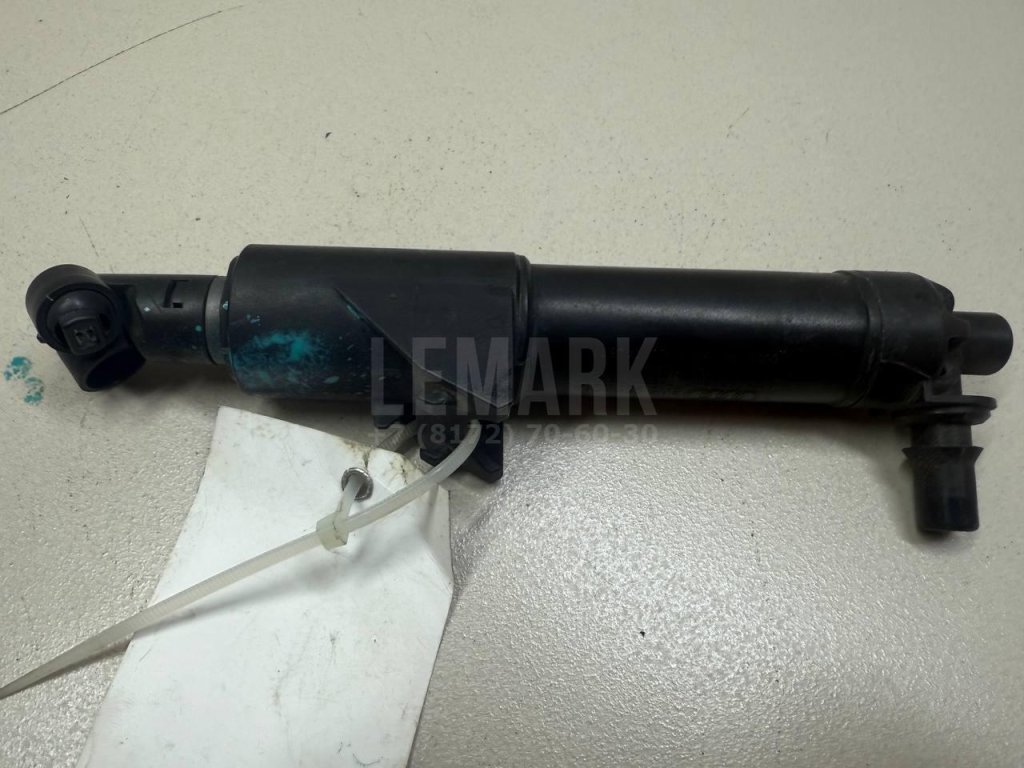 Форсунка омывателя фары