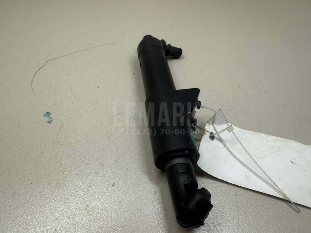 Форсунка омывателя фары