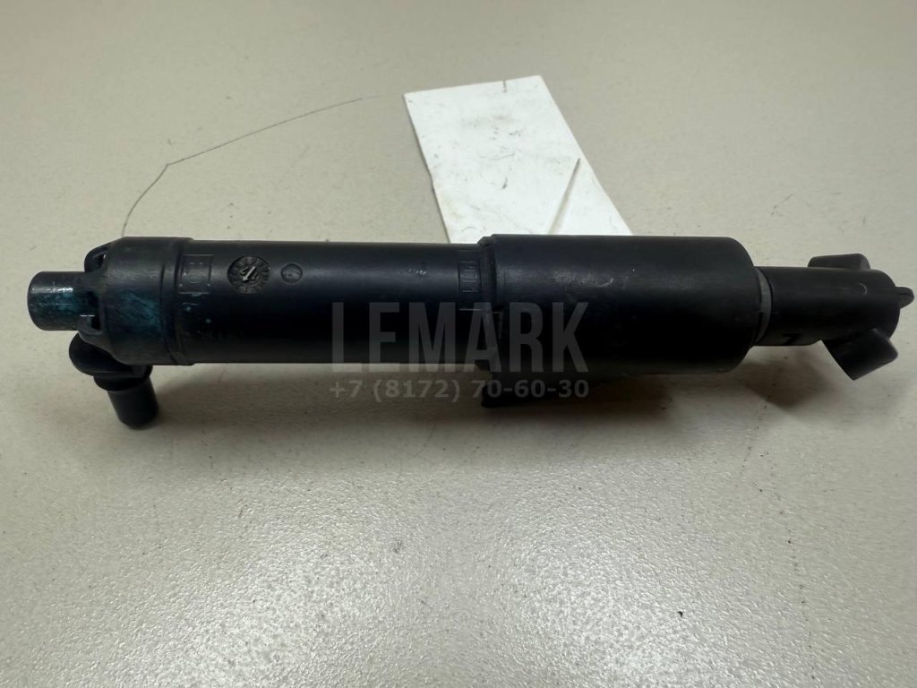 Форсунка омывателя фары