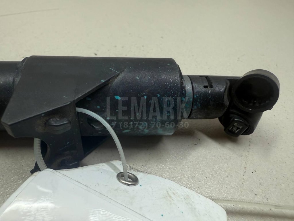 Форсунка омывателя фары