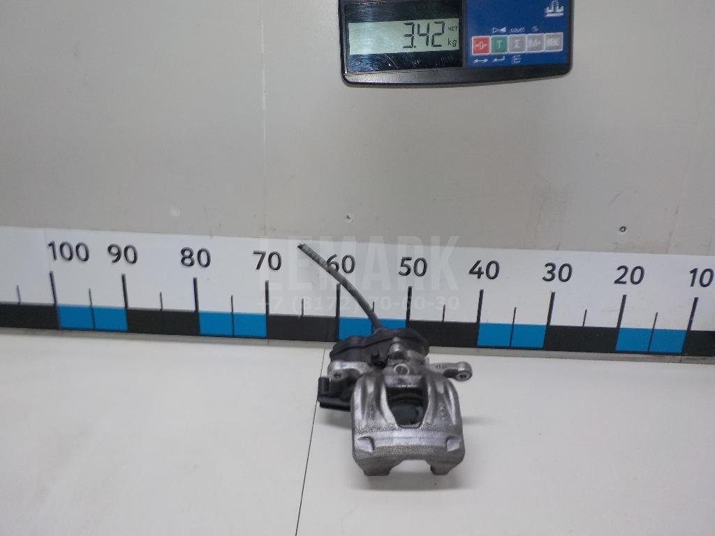 Суппорт тормозной задний правый