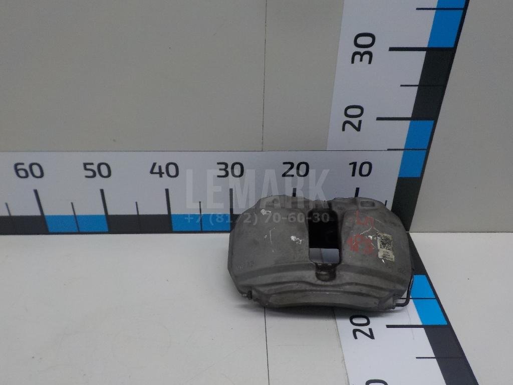 Суппорт тормозной передний левый