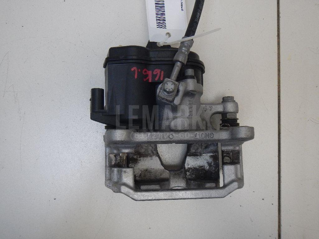 Суппорт тормозной задний левый