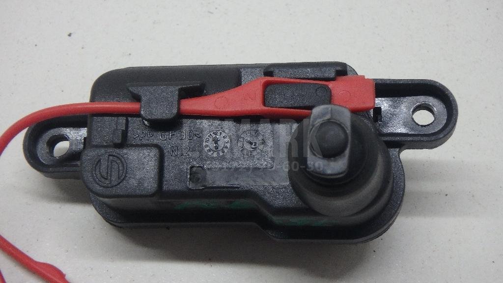 Активатор замка крышки бензобака