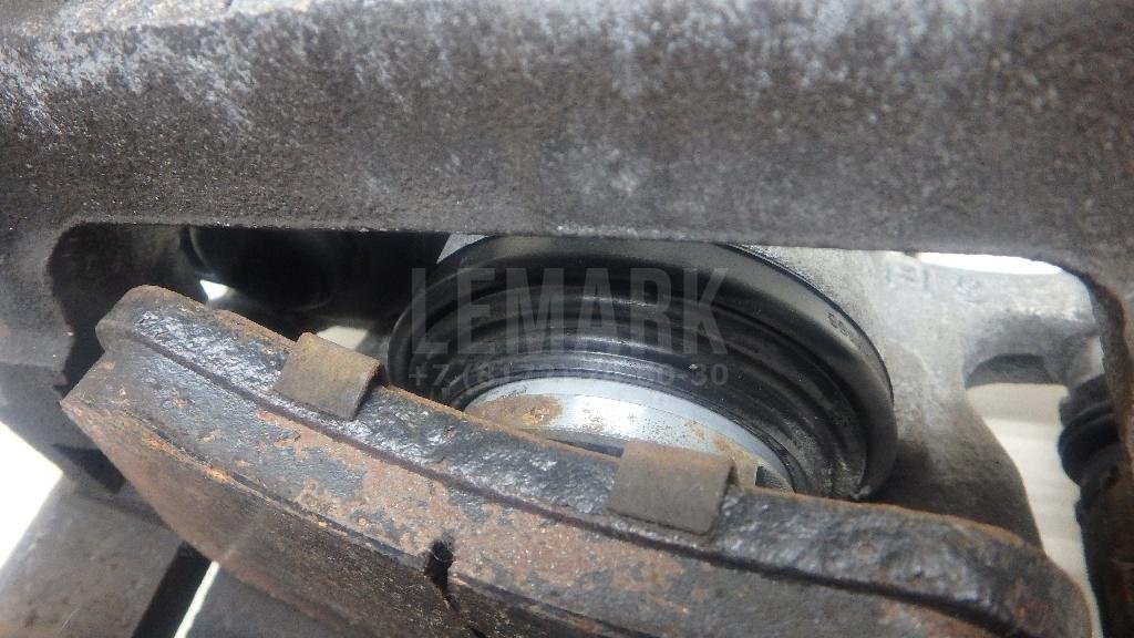 Суппорт тормозной задний левый