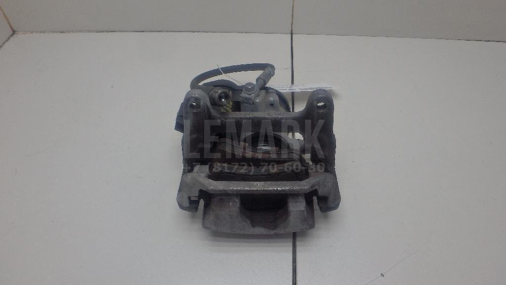 Суппорт тормозной задний левый