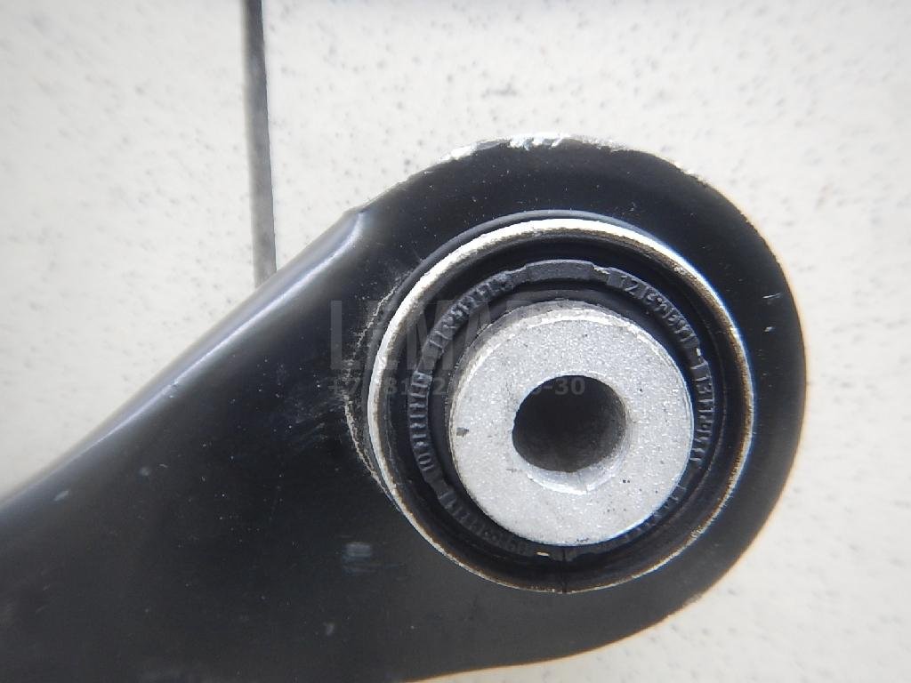 Рычаг задний верхний левый