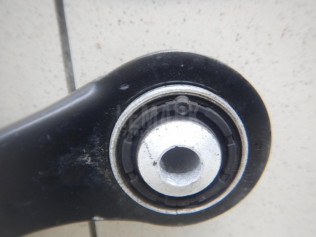 Рычаг задний верхний левый