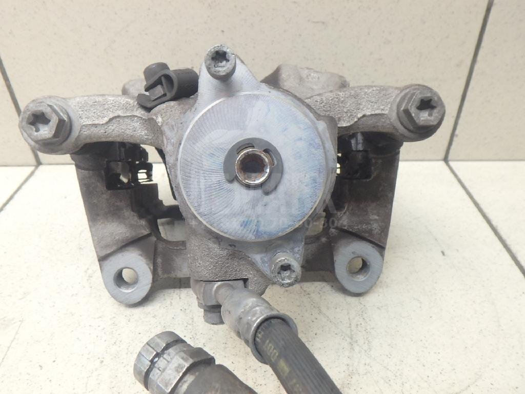 Суппорт тормозной задний левый