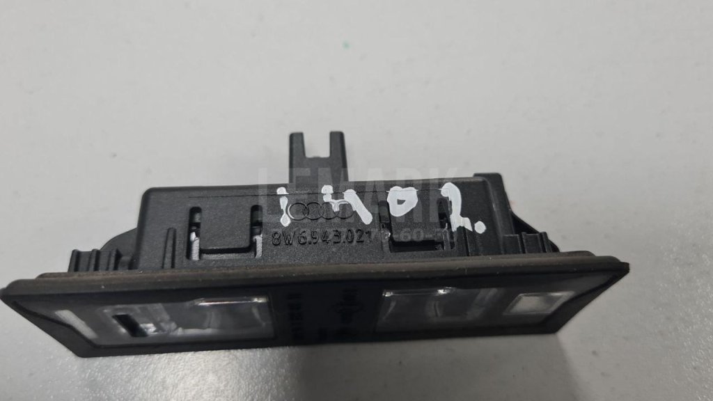 Фонарь подсветки номера