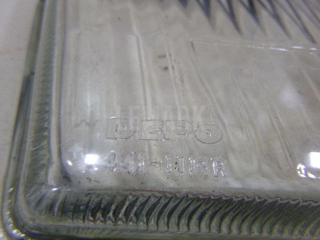 Стекло фары правой