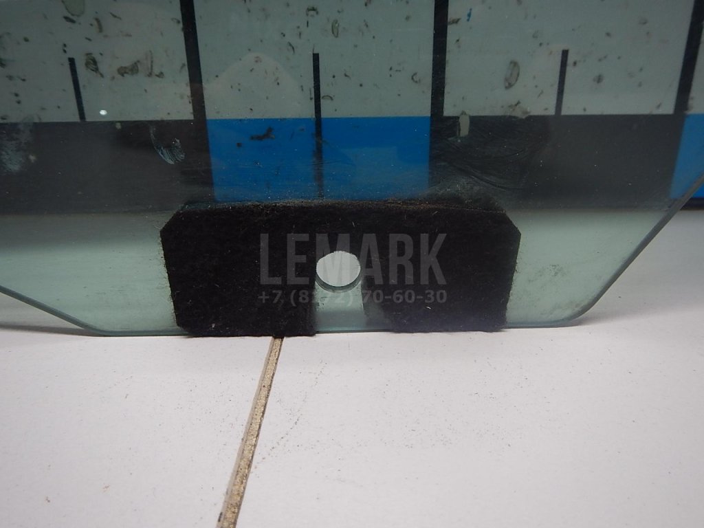 Стекло двери задней левой