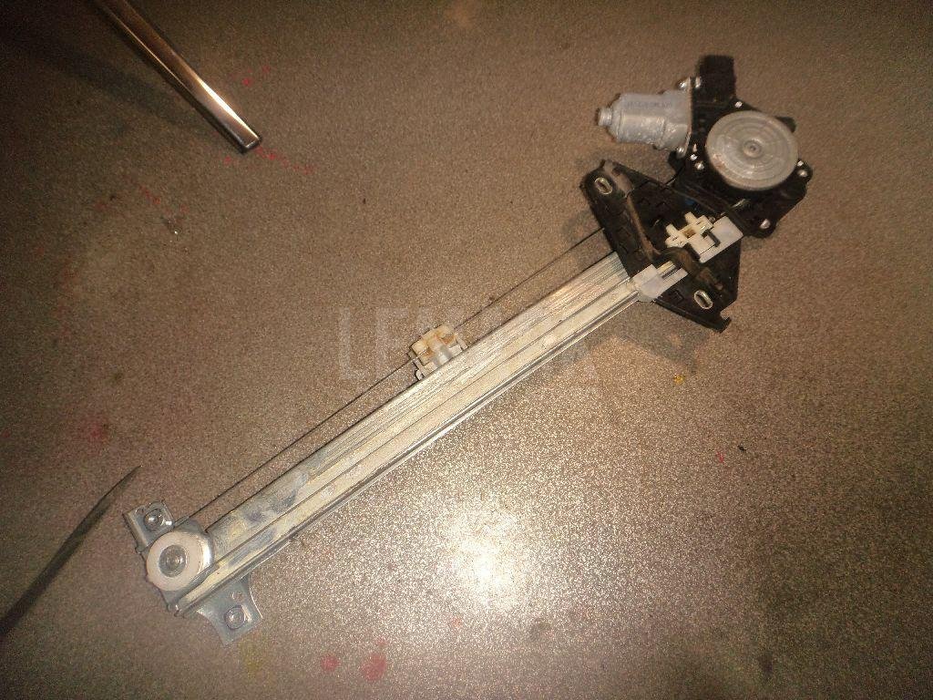 Стеклоподъемник электр. задний левый